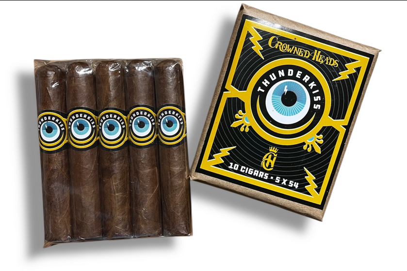 Pack of cigars with a decorative box featuring eye design and 'Crowned Heads' branding.