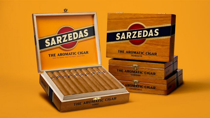 Sarzedas cigars in wooden packaging on an orange background