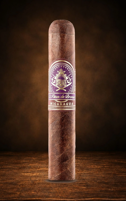 Cigar with a purple label on a wooden surface and dark background